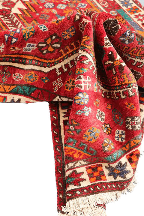 A hand-knotted Persian Qushqai Tribal Rug