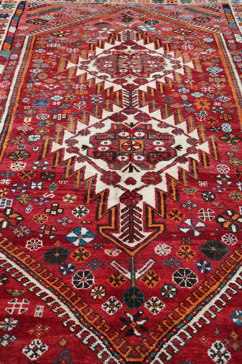 A hand-knotted Persian Qushqai Tribal Rug