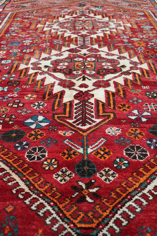A hand-knotted Persian Qushqai Tribal Rug