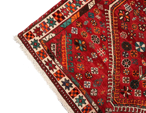 A hand-knotted Persian Qushqai Tribal Rug