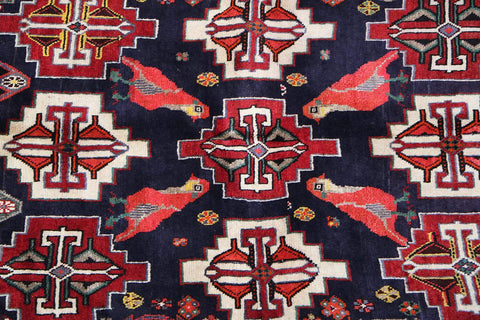 A hand-knotted Tribal Qashqai Wool Rug