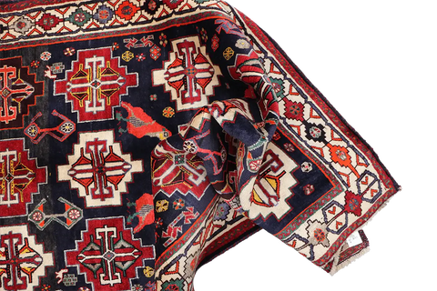 A hand-knotted Tribal Qashqai Wool Rug