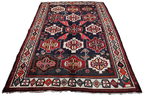 A hand-knotted Tribal Qashqai Wool Rug