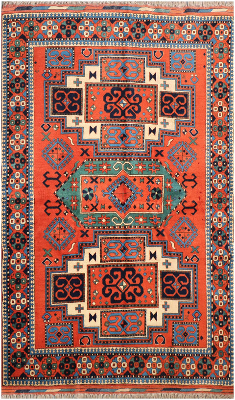 A hand-knotted Afghan tribal wool rug