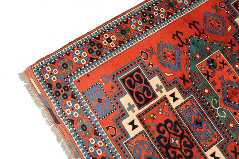 A hand-knotted Afghan tribal wool rug