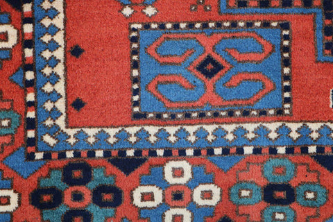 A hand-knotted Afghan tribal wool rug