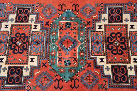 A hand-knotted Afghan tribal wool rug
