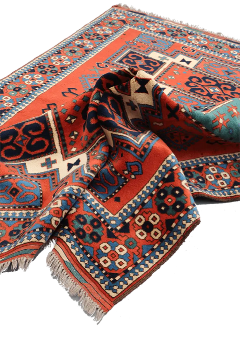 A hand-knotted Afghan tribal wool rug