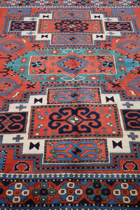 A hand-knotted Afghan tribal wool rug