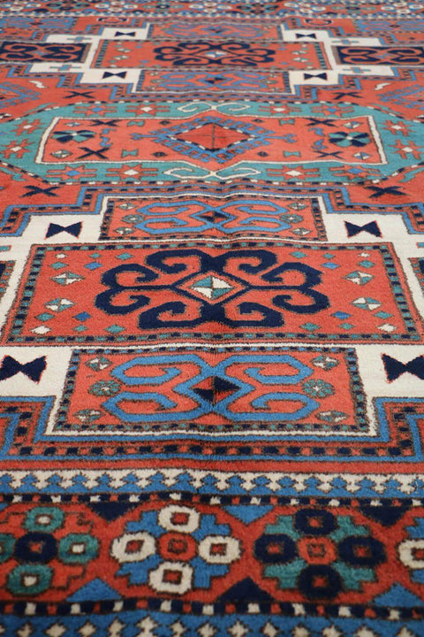 A hand-knotted Afghan tribal wool rug