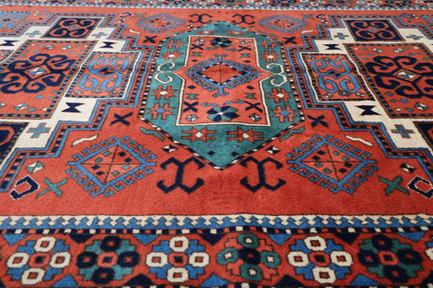 A hand-knotted Afghan tribal wool rug