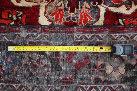 A vibrant red wool rug