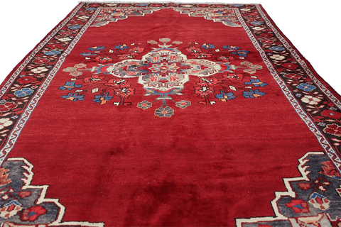 A vibrant red wool rug