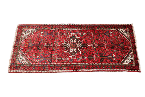 A long, rectangular, red wool rug 