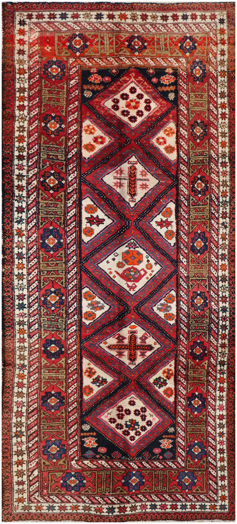 A rectangular Old Tabriz wool rug