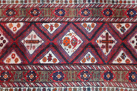 A rectangular Old Tabriz wool rug
