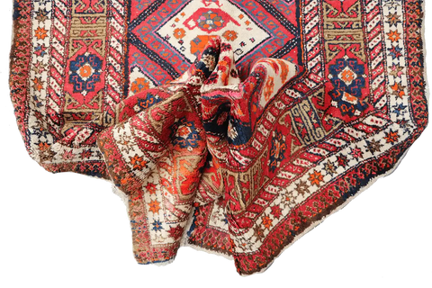 A rectangular Old Tabriz wool rug