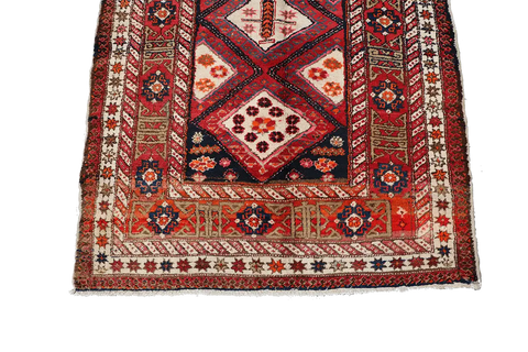 A rectangular Old Tabriz wool rug