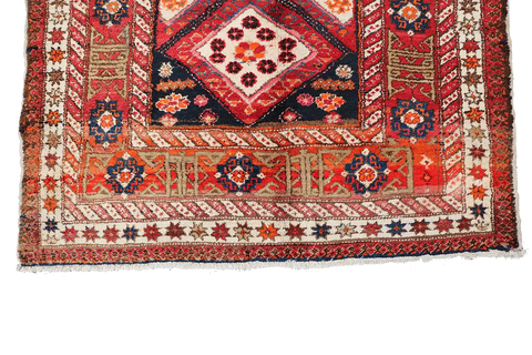 A rectangular Old Tabriz wool rug