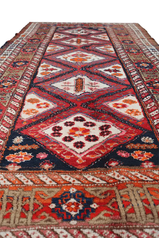 A rectangular Old Tabriz wool rug