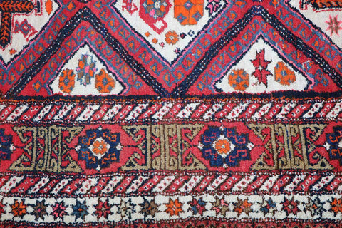 A rectangular Old Tabriz wool rug