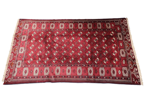 A hand-knotted Turkeman Tribal Wool Rug