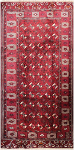 A hand-knotted Turkeman Tribal Wool Rug