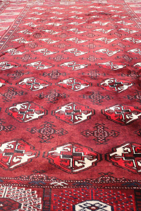 A hand-knotted Turkeman Tribal Wool Rug