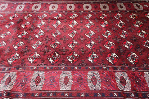 A hand-knotted Turkeman Tribal Wool Rug