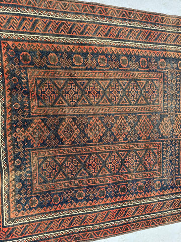 Persian Baluch tribal hand-knotted rug