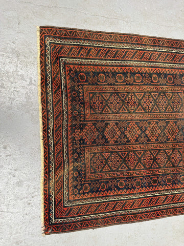 Persian Baluch tribal hand-knotted rug