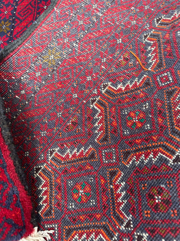Persian Baluch Tribal Hand-Knotted Rug with a pink and blue color palette
