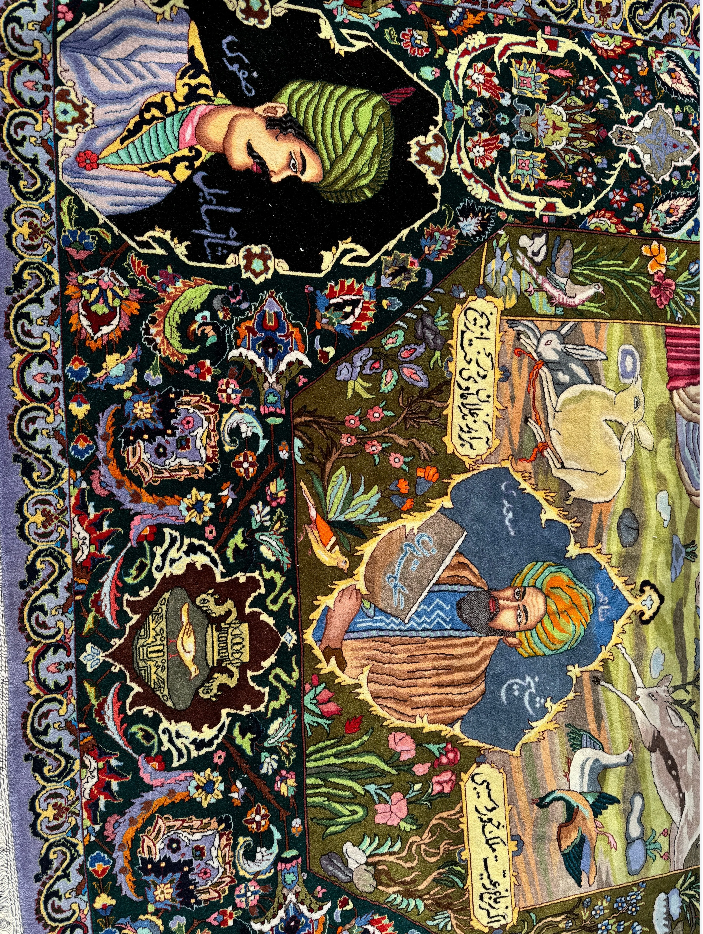 Decorative rug with intricate patterns and figures, featuring a person in a green headscarf and another in a blue outfit.