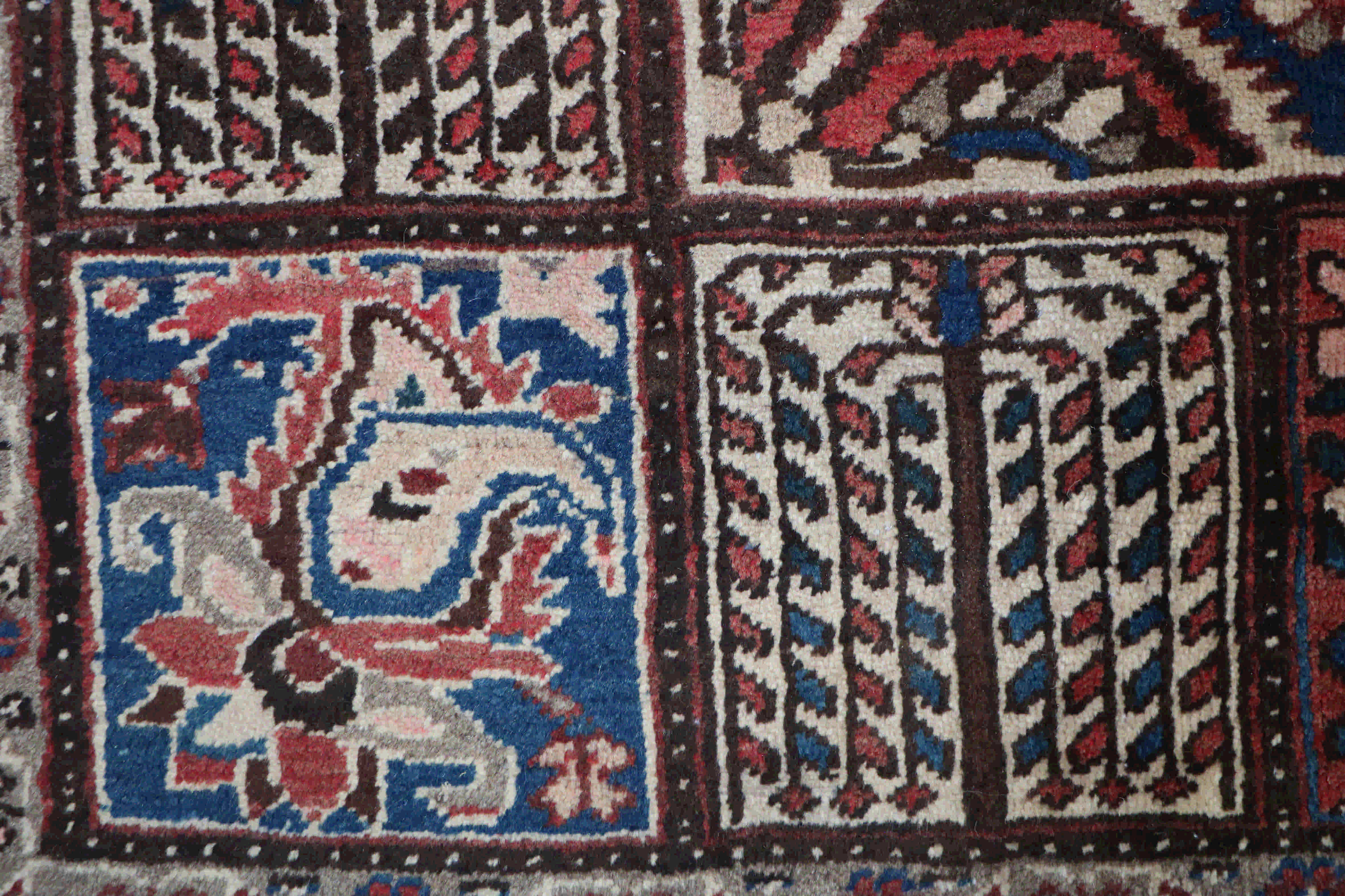 Old red and blue Persian Judaica bakhtiar rug