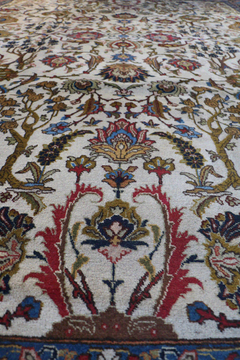 A traditional Persian Tabriz wool rug