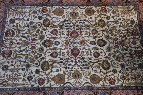 A traditional Persian Tabriz wool rug