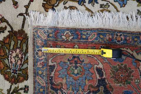A traditional Persian Tabriz wool rug