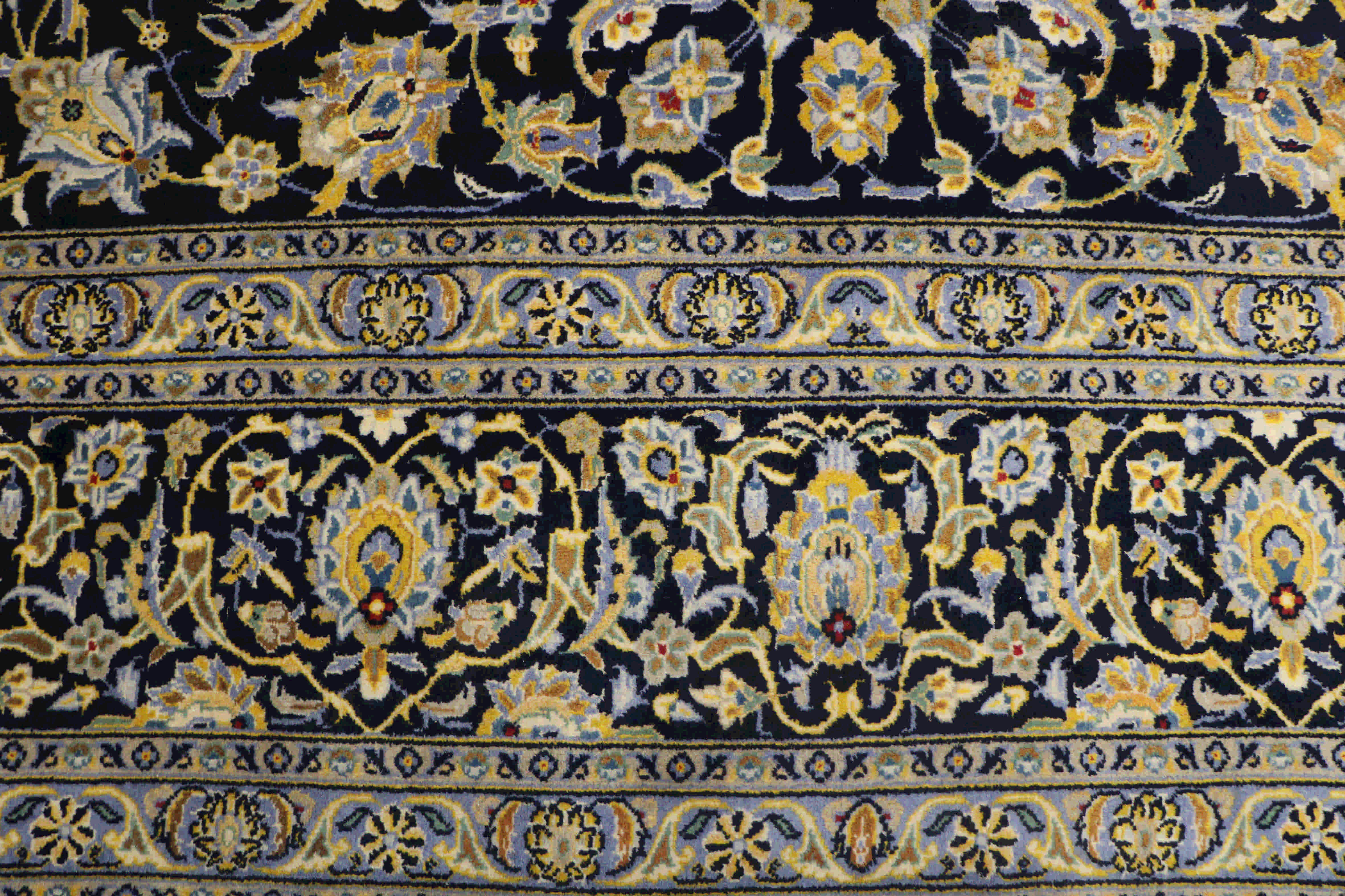 Blue and gold kashan rug