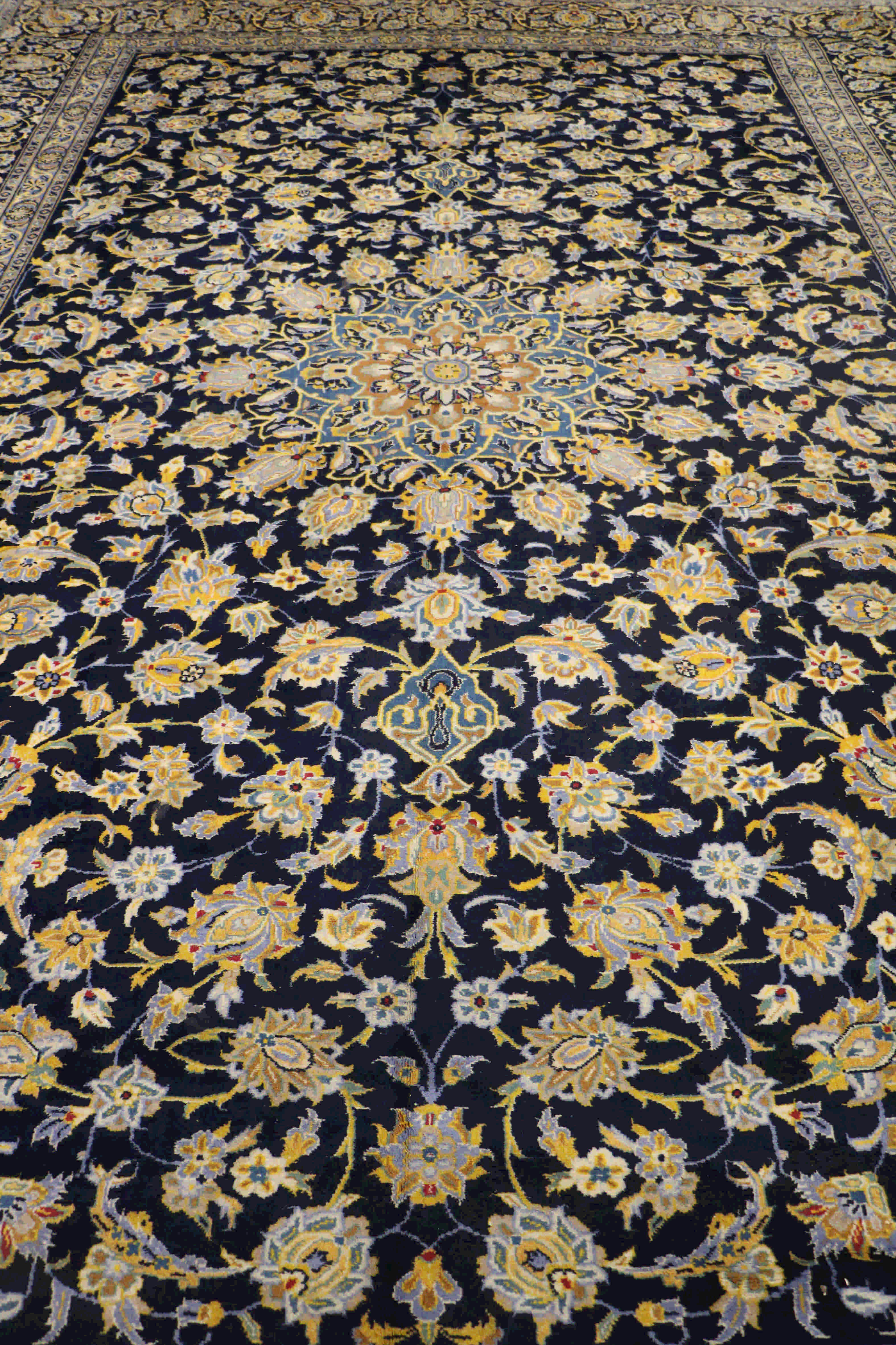 Blue and yellow persian kashan rug
