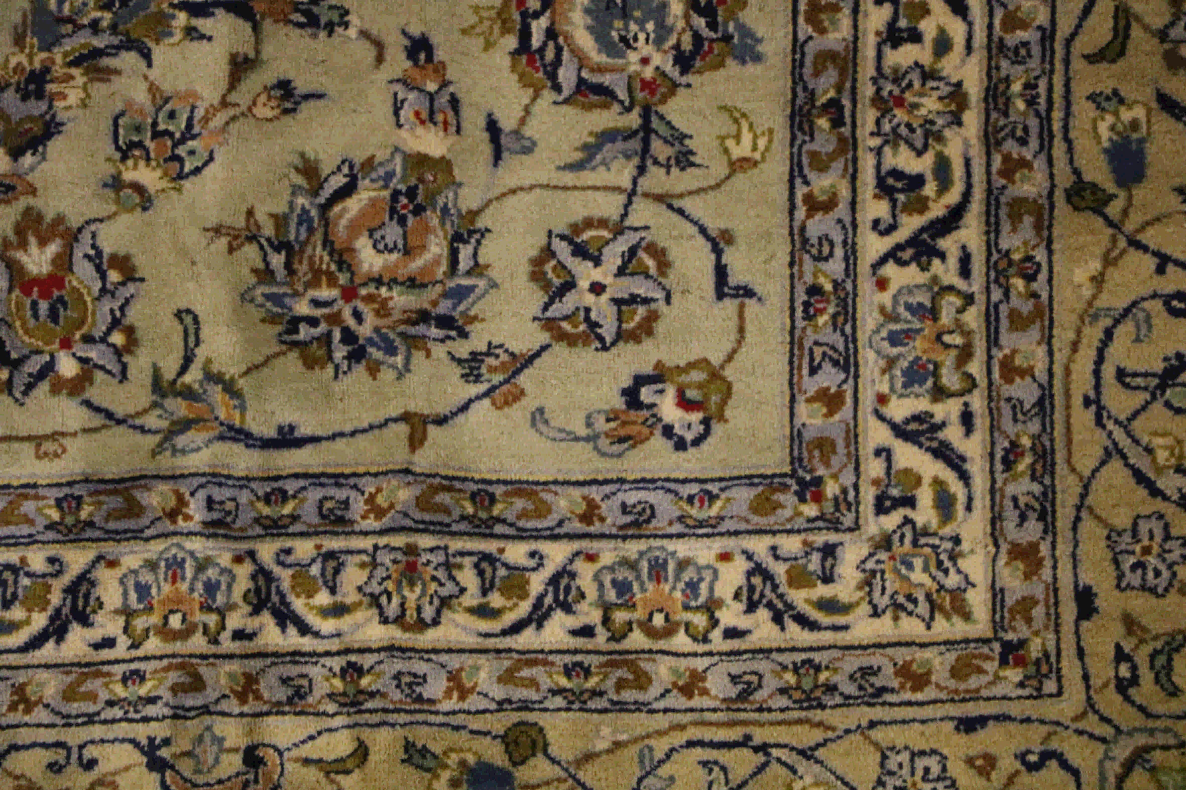 Light blue and cream persian Kashan rug border
